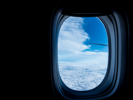 Porthole aircraft view beautiful sky background travel 