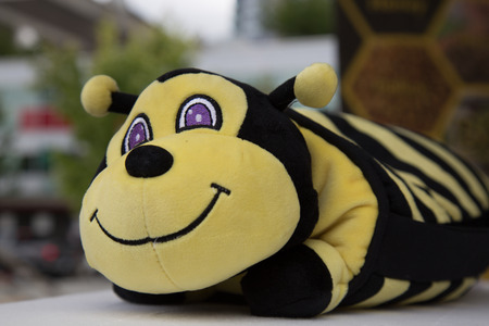 Positive smiling plush bee closeupの写真素材