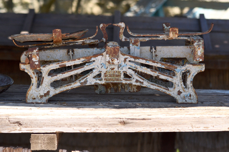Iron scales of old times, used in fruit and vegetable marketsの写真素材