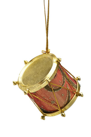 Christmas and New Year's drum on the white isolated background. The toy of old times.の写真素材