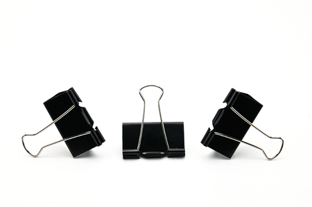 Binder clip device for tying paper sheets togetherの写真素材