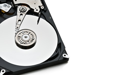 Internal parts of a hard disk on an isolated white background.の写真素材