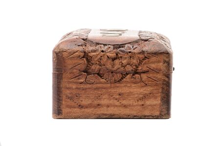 Vintage wooden jewelry box on an isolated white background.
