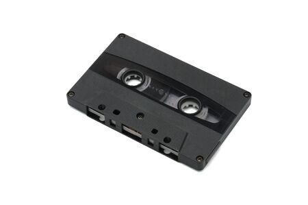 Vintage compact audio tapes for magnetic recording on an isolated white background.Compact cassettteの写真素材
