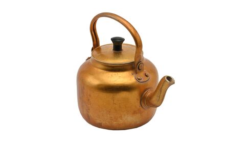 Gilded metal kettle on an isolated white background.Golden teapotの写真素材