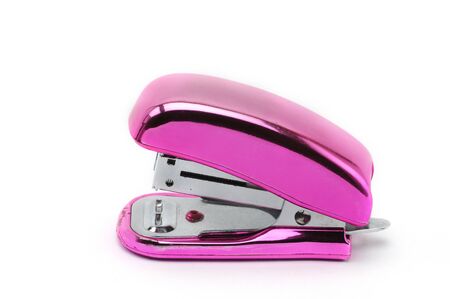 Pink office stapler on an isolated white backgroundの写真素材
