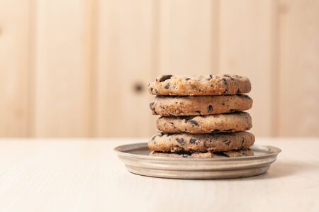 Sweet cookies with nuts and chocolate grainsの写真素材