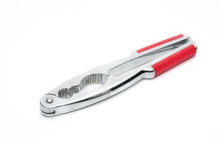 Nutcracker,tongs for nuts on an isolated white background