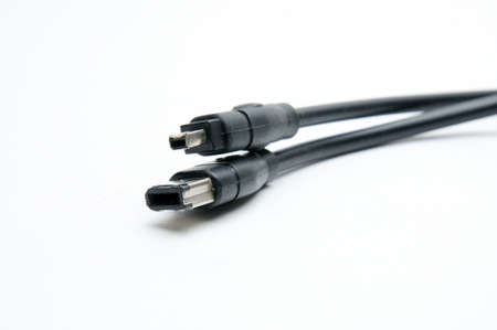 Digital cable with plugs standard DV, 1394 and ilink on isolated white background