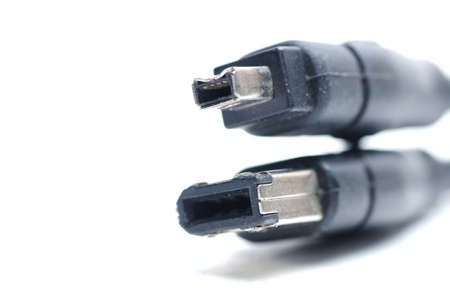 Digital cable with plugs standard DV, 1394 and ilink on isolated white background