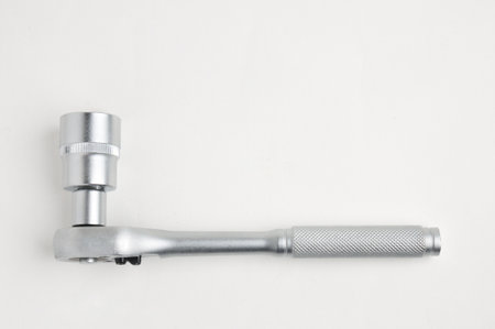 Wrench for nuts and bolts on an isolated white background