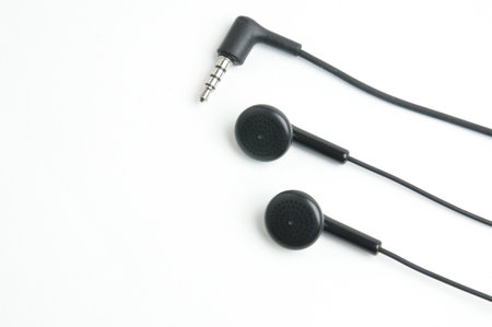 Earphone for music player and smart phone on isolated white background