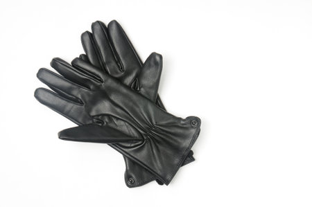 Casual leather gloves on white isolated background