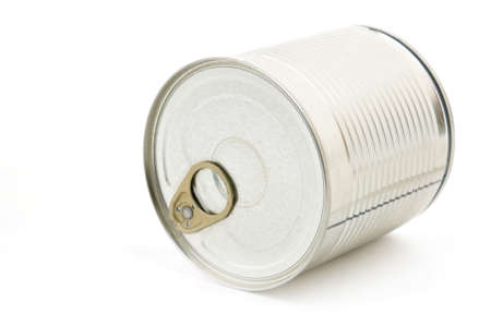 Metal tin can with green peas on isolated white backgroundの写真素材
