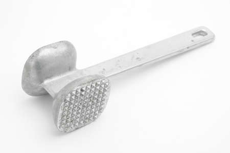 Metal hammer for meat on an isolated white background
