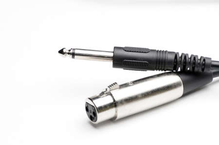 Audio cable with XLR and TRS jack connectors for microphones and professional audio equipment on an...
