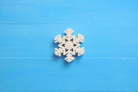 Christmas blue background with snowflakes for New Years holidayの写真素材