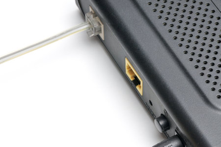 Cable with Rj 11 plug for a telephone line on an isolated white background