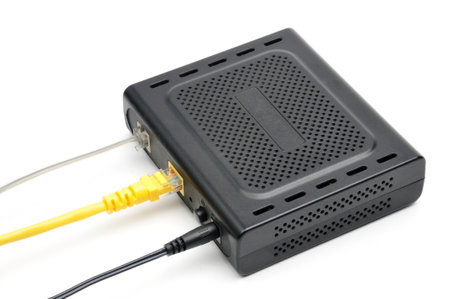 Router modem for connecting to the local and global Internet network on an isolated white backgroundの写真素材