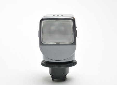 On-camera spotlight for lighting in dark conditions on an isolated white background