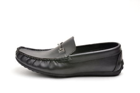 Men's leather shoes in the style of moccasins on an isolated white backgroundの写真素材