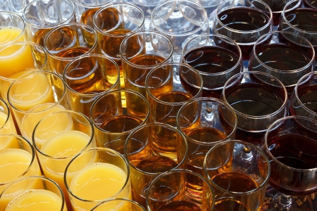 Orange juice, apple juice and red wine glasses