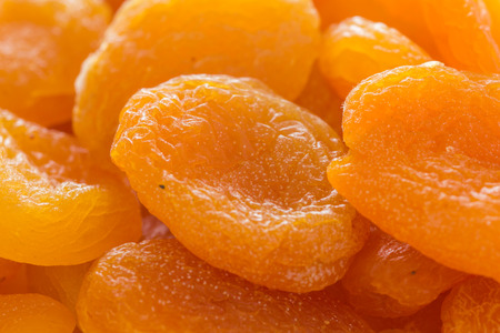 Whole dried apricots macro backgroundの写真素材