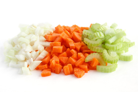 Classic mix of carrots, celery and onion all chopped up and ready to be used.の写真素材
