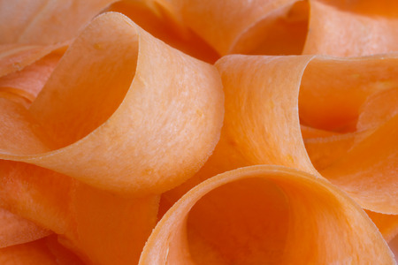 Detail of shaved carrots arranged in a abstract way の写真素材