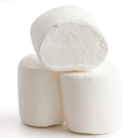 Three marshmallows stacked and isolated on white.の写真素材