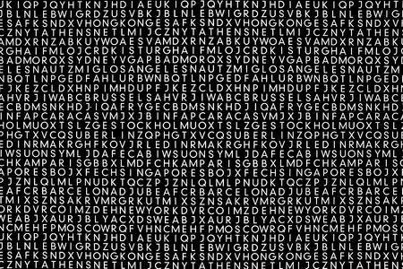 Many white sans alphabet letters on black.の写真素材