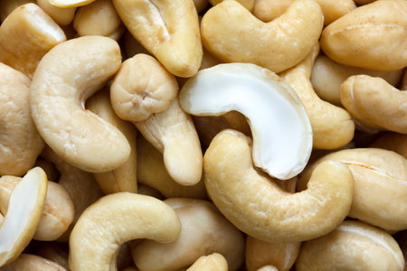 Detail of many cashew nuts from above. Abstract pattern.の写真素材
