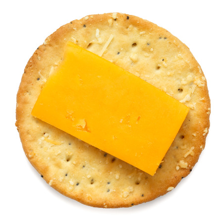 Crispy round cheese cracker from above. With cheddar.の写真素材