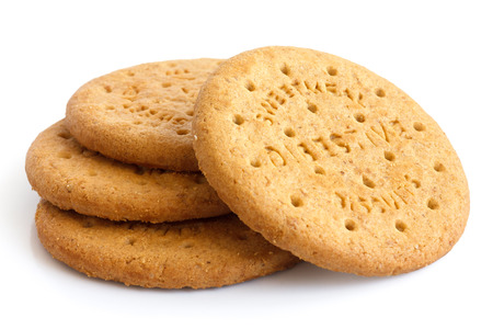 Stack of sweetmeal digestive biscuits isolated on white.の写真素材