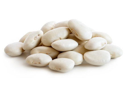 Heap of dry butter beansisolated on white.