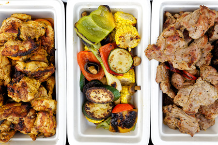 Barbecue grilled chicken, pork and vegetable from above.の写真素材