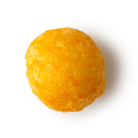 Single extruded puffed cheese ball isolated on white from above.の素材 [FY310100546428]