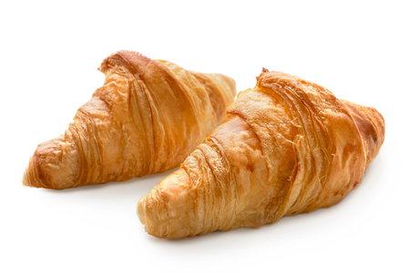 Two baked plain croissants isolated on white.の写真素材