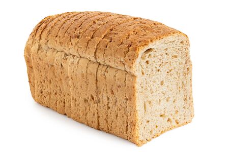 Sliced loaf of whole wheat toast bread isolated on white.の写真素材