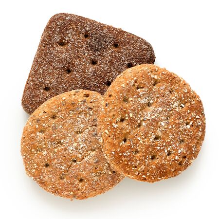 Two round oat wheat flat breads and one square rye flat bread isolated on white. Top view.の写真素材