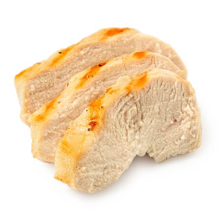 Three slices of grilled chicken breast with grill marks isolated on white.の写真素材