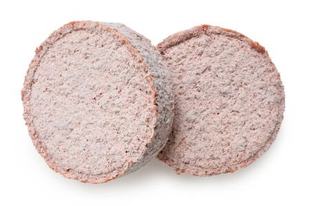 Two frozen plant based burger patties isolated on white. Top view.の写真素材