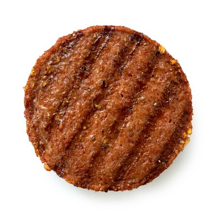 Plant based grilled burger patty with grill marks isolated on white. Top view.の写真素材