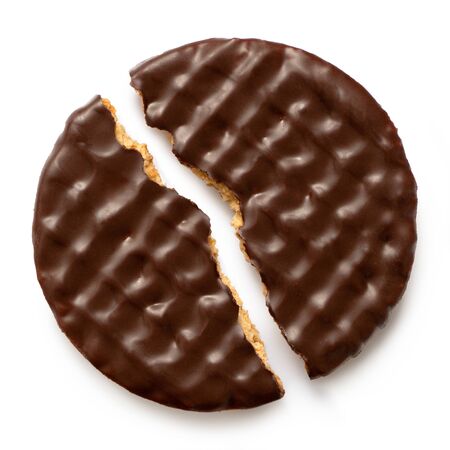 Dark chocolate coated digestive biscuit broken half isolated on white. Top view.の写真素材
