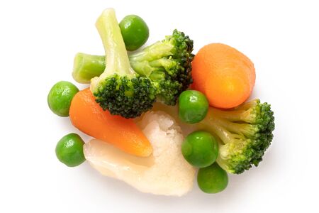 Pile of mixed vegetables isolated on white. Top view.の写真素材