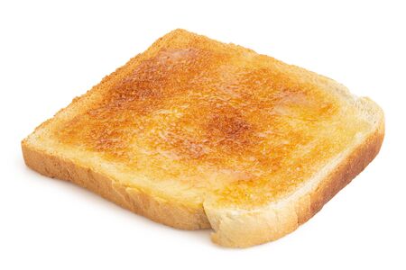 Single slice of white toast spread with butter isolated on white.の写真素材