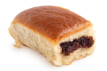 Czech yeast bun filled with plum jam isolated on white.の写真素材