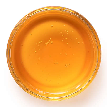 Chicory syrup in a glass dish isolated on white. Top view.の写真素材