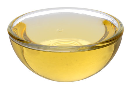 Agave syrup in a glass bowl isolated on white.の写真素材