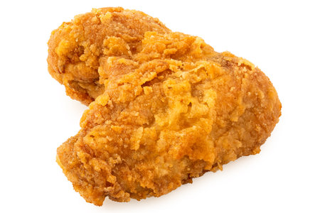 Crispy fried chicken wing isolated on white.の写真素材